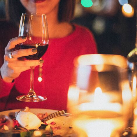 woman-holding-wine-glass-selective-focus-photography-1850595